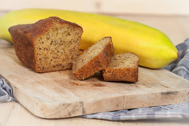 istock Homemade banana bread sliced on a table . rustic style 517376714