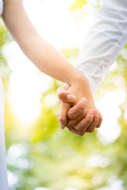istock Young couple walking, Hyde Park, London: sunset colour tone 517376742