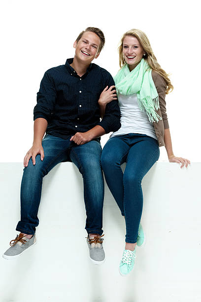 istock Happy couple sitting on box 517377440