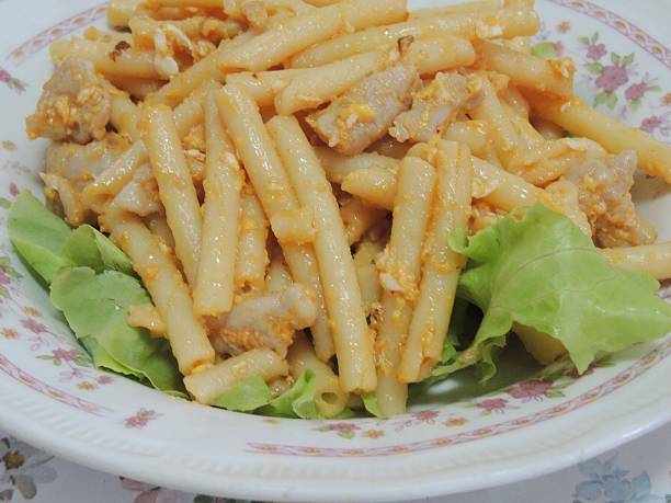 istock Thai style stir fry Macaroni with egg in tomato sauce 517377894