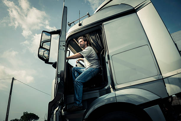 Coming Out Of Track Truck driver coming out of track clambering photos stock pictures, royalty-free photos & images