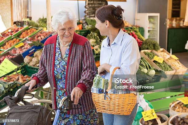 Assisted Living Senior Woman With Caregiver Shopping Stock Photo - Download Image Now