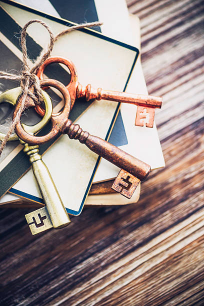 istock Old Keys with Old Books and Photos 517379495