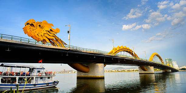 istock Dragon bridge cross Han river at Danang city 517379881