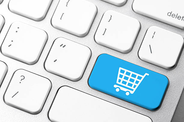 istock Business & e-commerce shopping cart icon on computer keyboard button 517380280