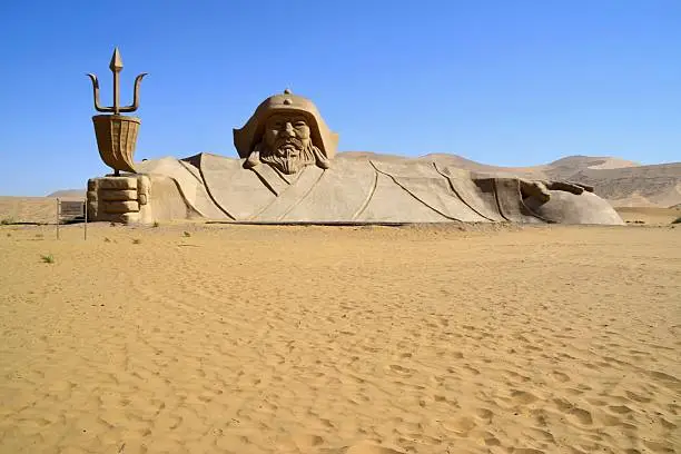 The enormous Genghis Khan statue in the middle of Badain Jaran desert. This desert is home to some of the tallest stationary dunes on Earth, some reaching a height of more than 500 meters. The desert features over 100 lakes that lie between the dunes, some of which are fresh water while others are extremely saline. 