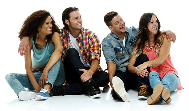 istock Four friends sitting and looking away 517383524
