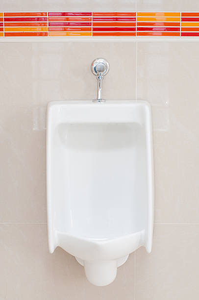 istock White porcelain urinals 517395943