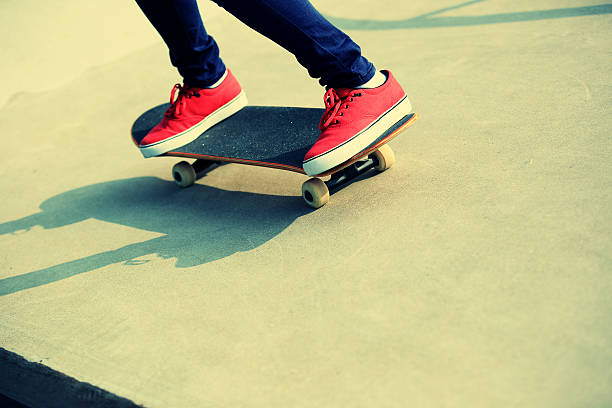 istock skateboarding at skatepark 517398281