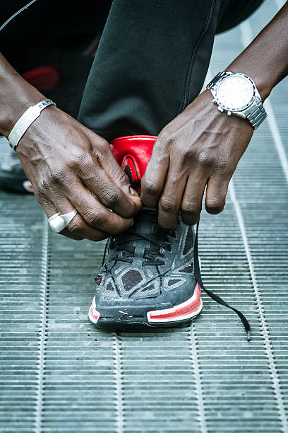 istock Young man Tying Shoelace 517399909