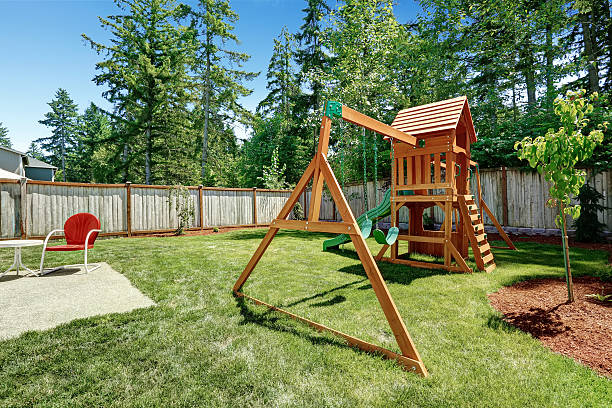 istock Backyad with playground for kids. 517400409