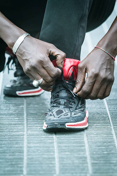 istock Young man Tying Shoelace 517401759