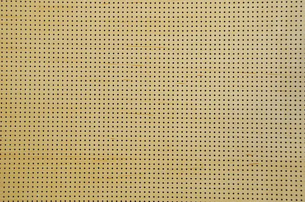 perforated wooden surface background