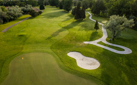 Aerial view of a beautiful green golf course.