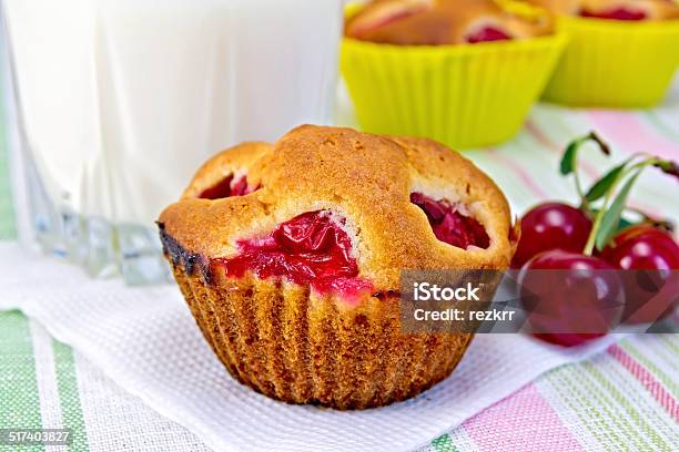 Cupcake With Cherries And Milk On Napkin Stock Photo - Download Image Now - Backgrounds, Baked, Baked Pastry Item