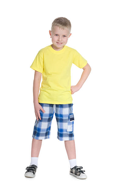 istock Happy little boy in a yellow shirt 517407298