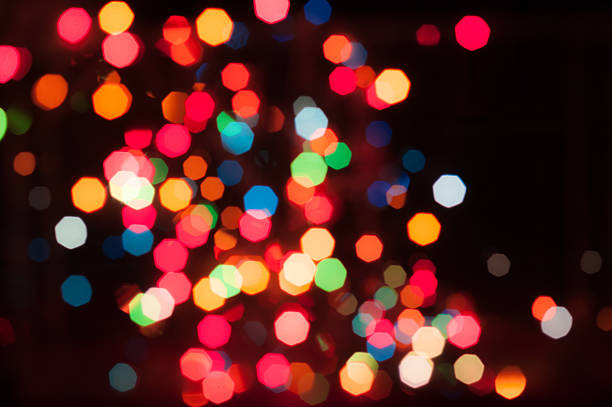 istock Defocused abstract bokeh light of Christmas tree 517409480