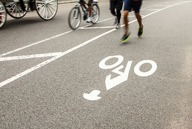 istock Joggers and bicycle riders in Central Park 517409754