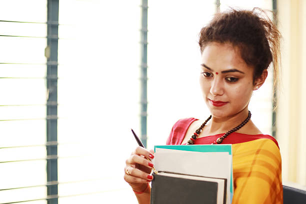 istock Lady Professor with Books 517409796