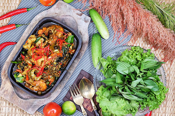 istock Curry Steamed Seafood in Coconut Cup 517410812