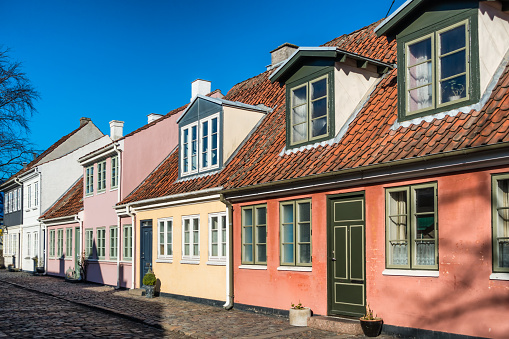 Old homes in cobbled streets in Odense, the city of Hans Christian Andersen, Denmark