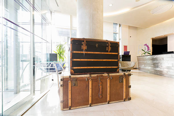 istock Vintage suitcases in hotel lobby 517417090