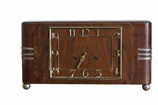 istock retro Wood clock isolated over white background 517417703