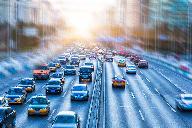 istock motion cars go through city 517418408