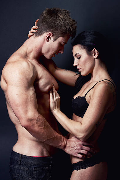 istock Attractive couple romancing together 517419642