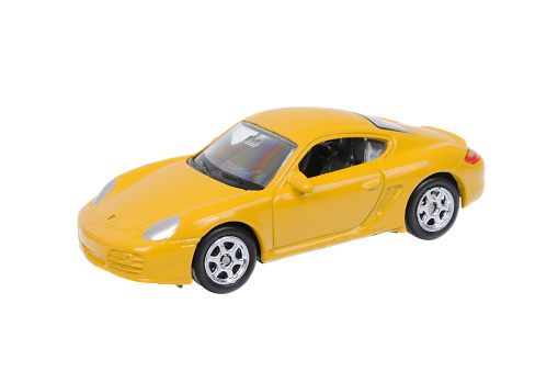 Adelaide, Australia - March 25, 2016:An isolated shot of a Porsche Cayman S Welly Diecast Toy Car. Replica diecast toy cars are highly sought after collectables.