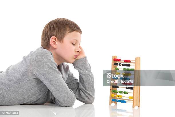 Boring Maths Stock Photo - Download Image Now - 10-11 Years, Abacus, Blond Hair