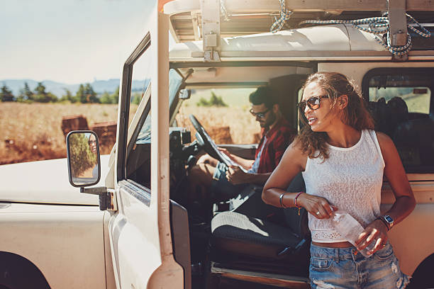 istock Young couple taking a break on road trip 517421876