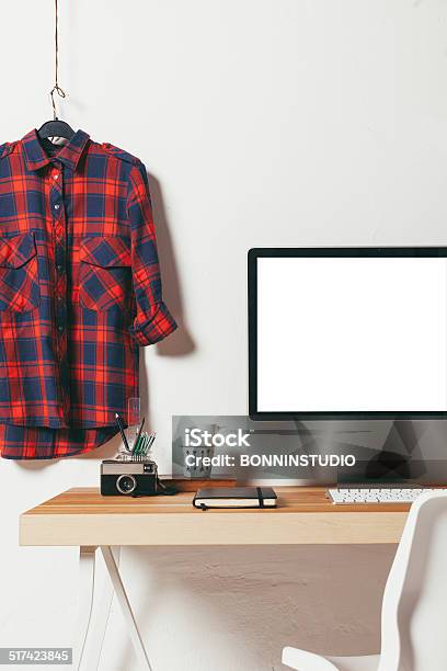 Closeup Of Minimal Office On White Background Stock Photo - Download Image Now - Button Down Shirt, Sparse, Backgrounds