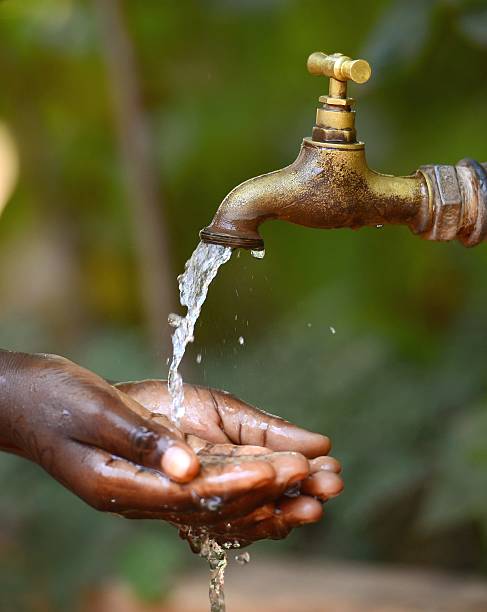 istock Social Issues: Water Scarsity Problem: Drinking Symbol for African Children 517424109