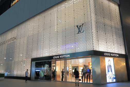 Nagoya Japan - September 26, 2014: People shop at Louis Vutton shop in Nagoya downtown Japan