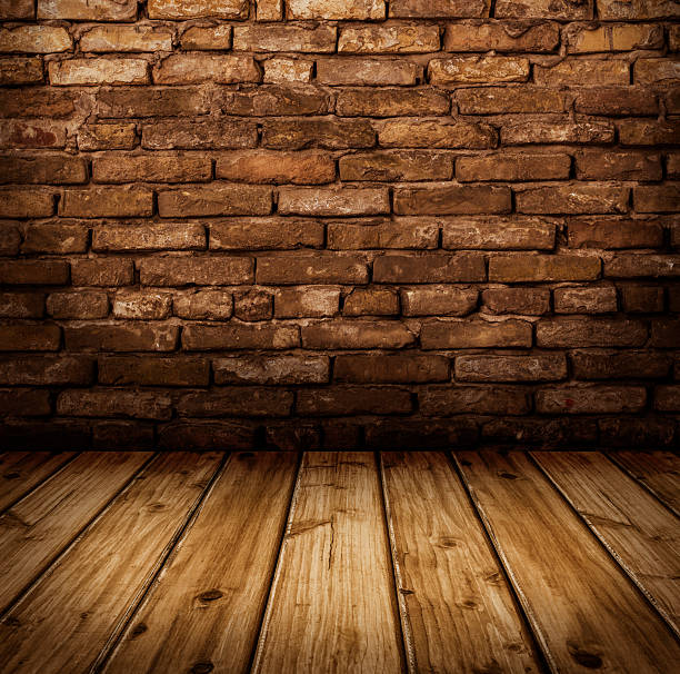 Interior with wooden floor and brick wall stock photo