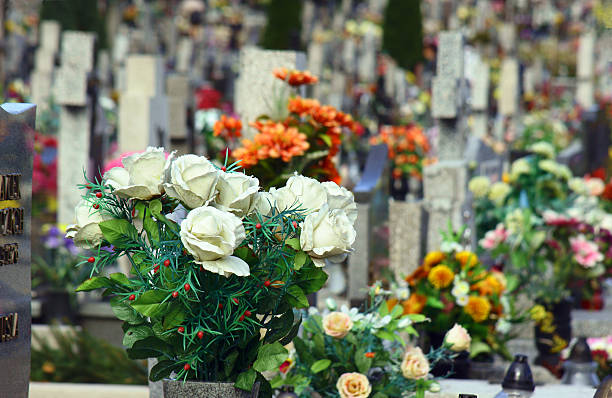 istock Flowers on the grave 517444045