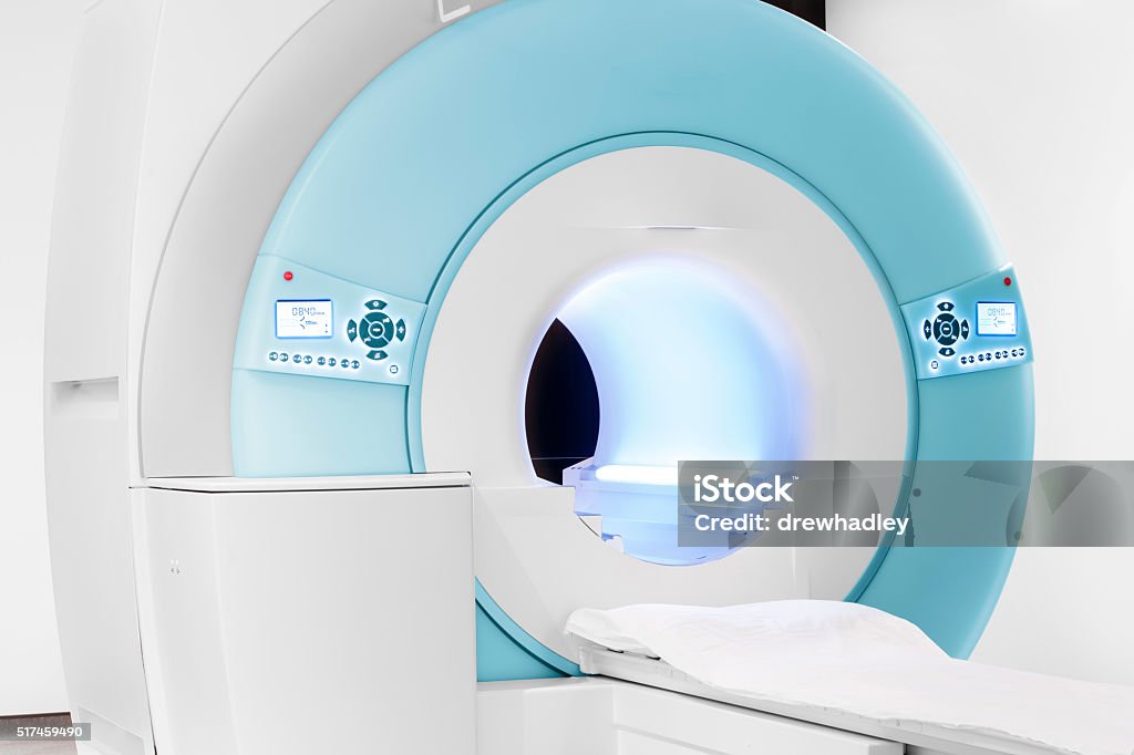 MRI – Magnetic Resonance Imaging machine Image showing a new open bore MRI scanner in medical centre. Tight crop Horizontal. MRI Scan Stock Photo