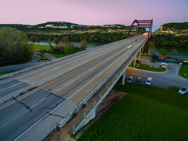 istock Glowing Sunset Over Pennybacker Bridge Austin Texas Landmark Attraction 517463378