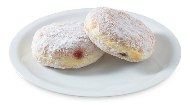 istock Two Donut Filled with Strawberry Jam on White Background 517463966