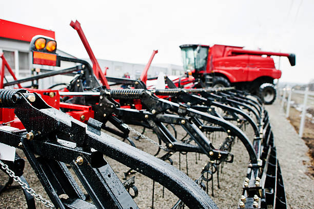 istock New red agricultural seeder close up view 517465042