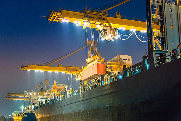 Cargo ship in the harbor at night