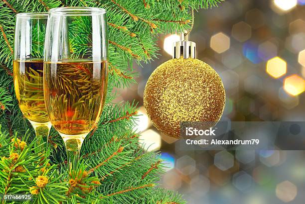 Two Glasses Of Wine Under The Christmas Tree Stock Photo - Download Image Now - Alcohol - Drink, Branch - Plant Part, Bright