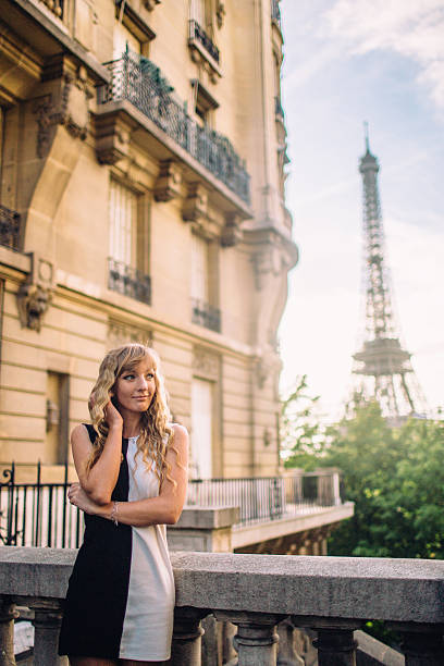 istock Girl in Paris on a sunny spring or fall day 517467314