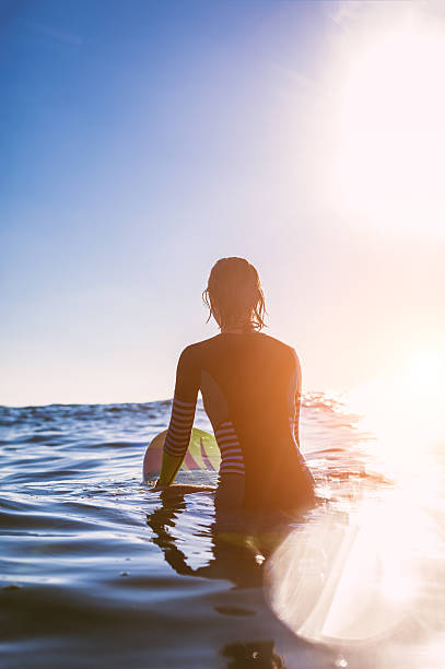 istock surfer girl 517467386