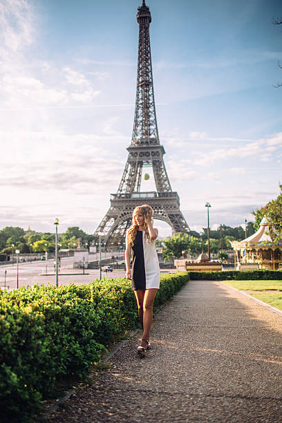 istock Girl in Paris on a sunny spring or fall day 517467840