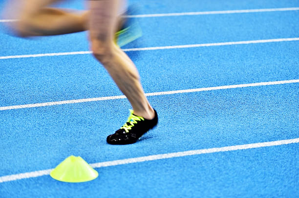 istock Blurred athlete feet on sprint track 517468446