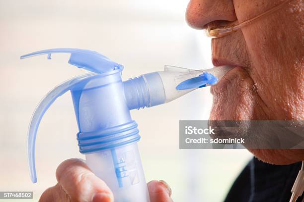 Close Up Of Elderly Man Using Nebulizer Stock Photo - Download Image Now - Chronic Obstructive Pulmonary Disease, Breathing Exercise, Senior Adult