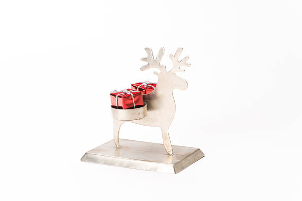 istock Christmas reindeer with gift 517471461
