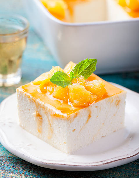 istock Cheesecake, cottage cheese pudding with fresh oranges and orange marmalade 517473010